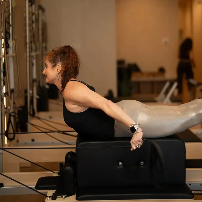 Pilates class session at Revival Pilates Studio with instructor guiding clients